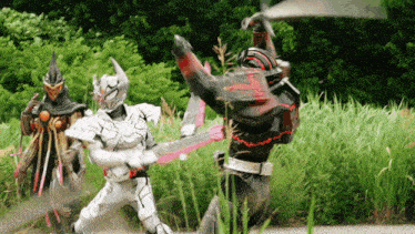 a group of superheros are fighting each other with swords