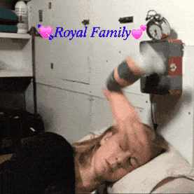 a woman is laying on a bed with the words royal family written above her