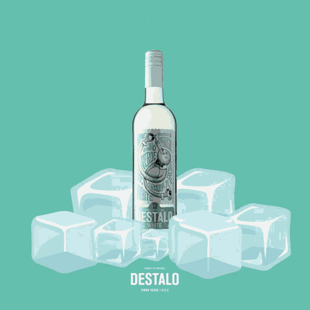 a bottle of destalo white wine sits on ice cubes