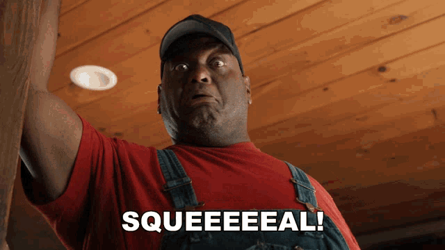 a man in overalls and a red shirt says squeeeeal