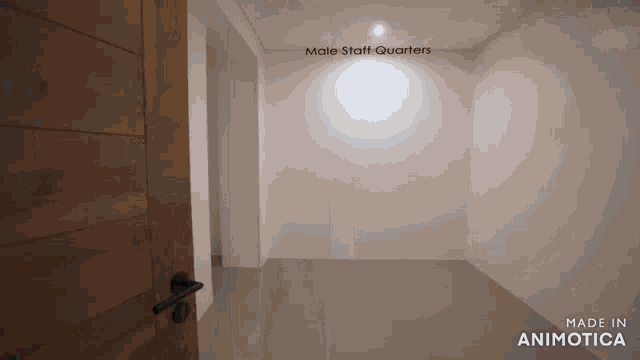 an empty room with the words male staff quarters above the door
