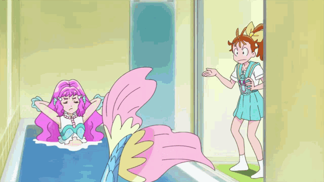 a girl standing next to a mermaid in a bathtub with a surprised look on her face