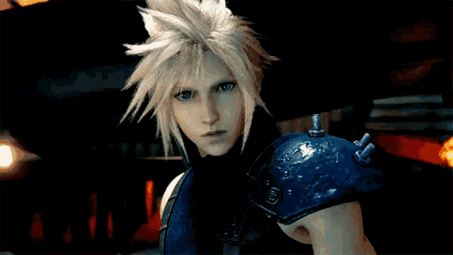 a video game character with blonde hair and a blue armor