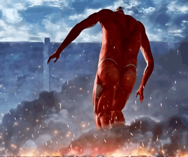 a man in a red suit is standing in front of a fire