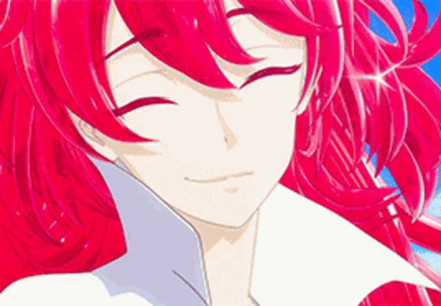 a close up of a girl with red hair and a white shirt .