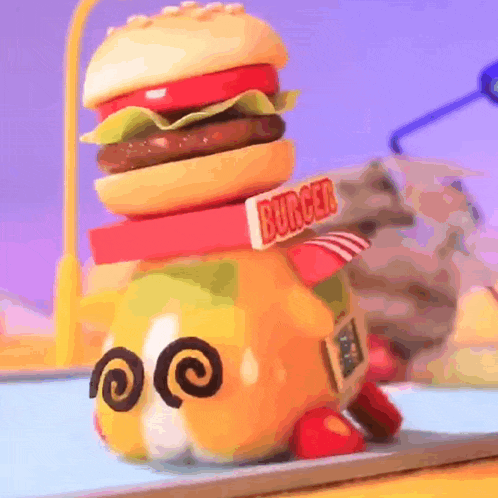 a toy hamburger with a sign that says " burger " on it