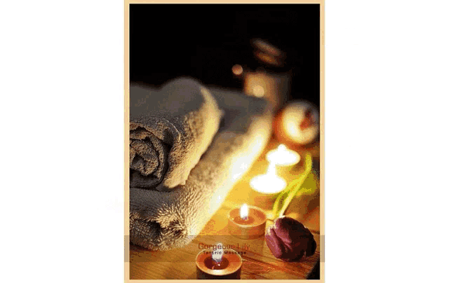 a picture of towels and candles with the words gorgeous life
