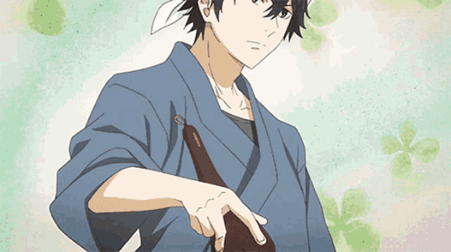 a drawing of a man in a blue kimono pointing