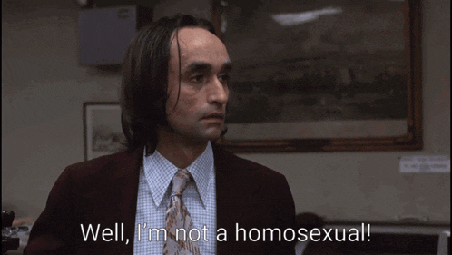a man in a suit says well i 'm not a homosexual