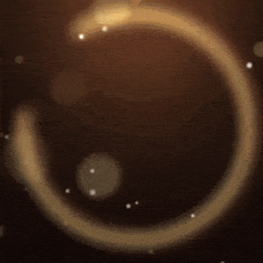gold circles on a dark brown background with a few white dots