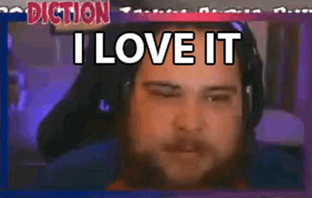 a man wearing headphones says i love it in front of a screen .