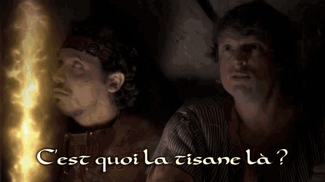 two men are looking at a fire with the words c'est quoi la tisane la written below them