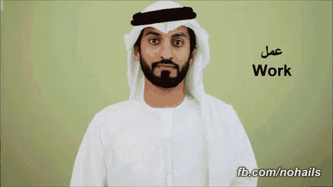a man with a beard is wearing a white robe and a white head scarf with the word work written on the bottom