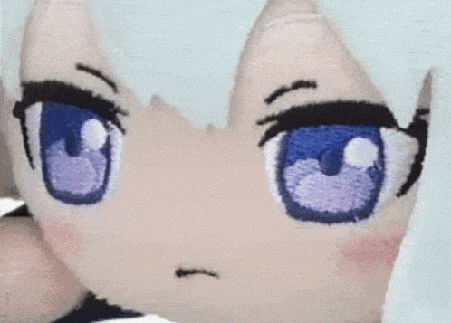 a cube with a picture of a girl with blue eyes on it