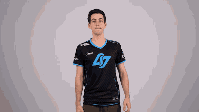 a man wearing a black and blue ls7 jersey