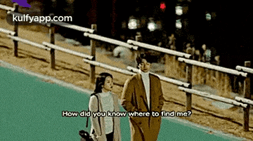 a man and a woman are standing next to each other on a sidewalk and the man is asking the woman where to find him