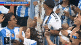 a group of people gathered in a stadium with a headline that says la otra cara de argentina