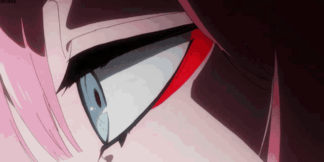 a close up of a person 's eyes with the word crisis visible