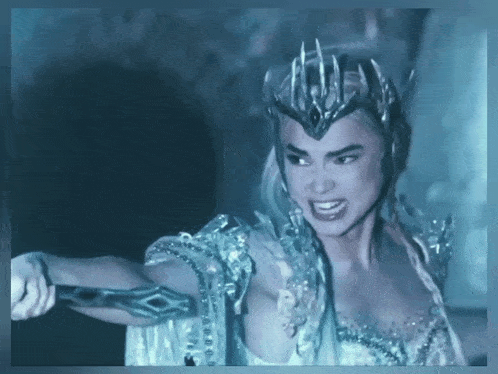 a woman with a crown on her head is holding a sword in her hand