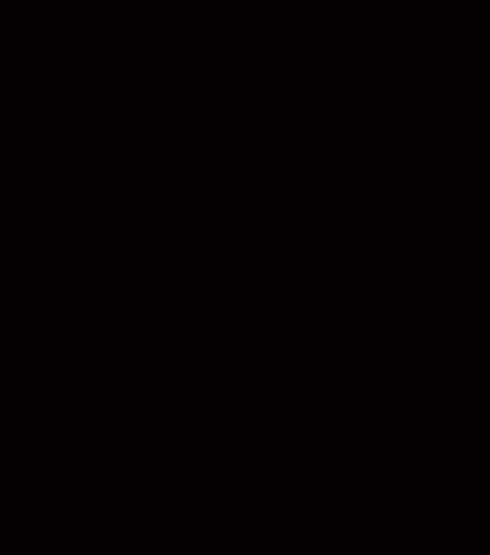 a red circle is floating in the dark .