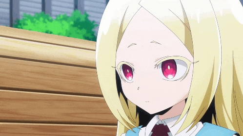 a little girl with blonde hair and red eyes is sitting on a bench