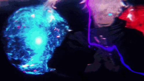 a person is holding a blue sphere in their hands .