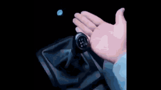 a blurry picture of a person 's face and a blue background