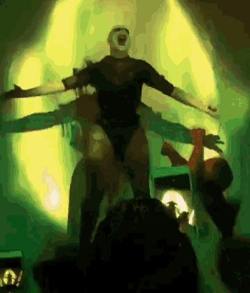 a drawing of a man with his arms outstretched in a dark room