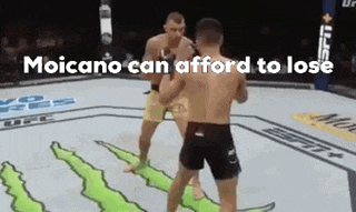 two men are fighting in a boxing ring with the words `` moicano can afford to lose '' on the bottom .