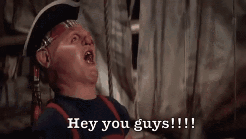 a man in a pirate hat is saying hey you guys !!