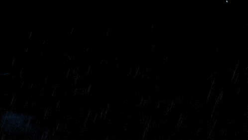 a blue sky with a few clouds and lightning in it