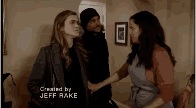 a man and two women are standing next to each other with a caption that says created by jeff rake