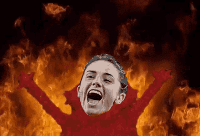 a woman is screaming in front of a fire filled background