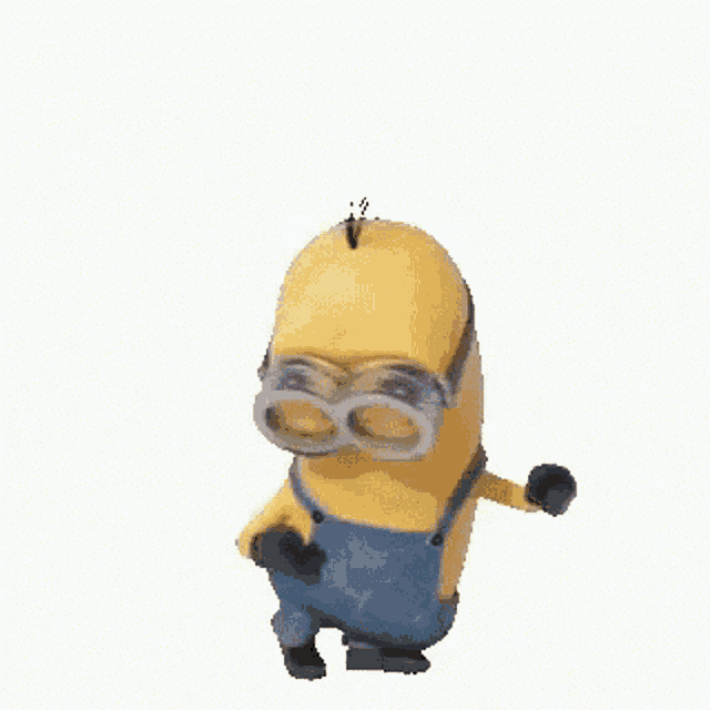 a yellow minion wearing goggles and overalls is standing on a white background .