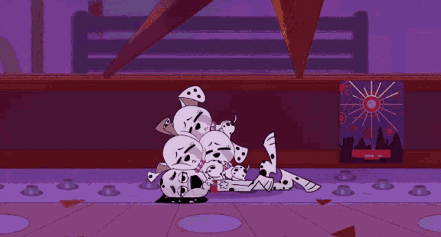 a bunch of dalmatian dogs are laying on a purple floor