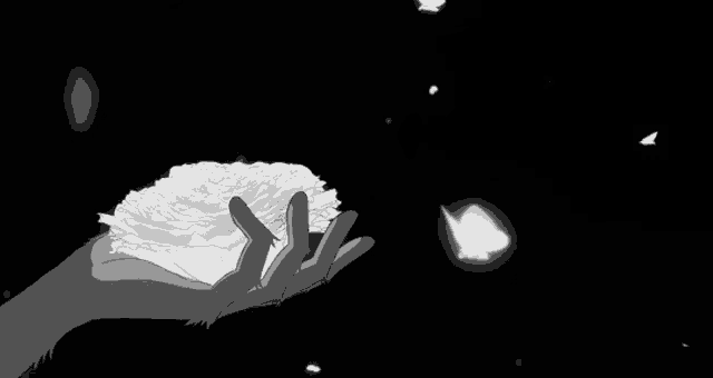a black and white drawing of a hand holding a glowing object in the dark .