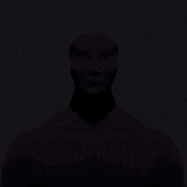 a silhouette of a person with a colorful pattern on it