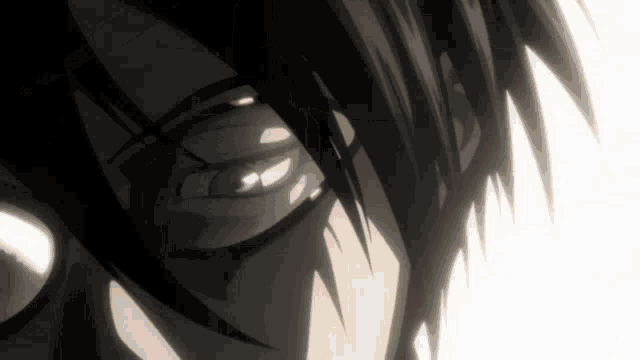 a close up of a person 's eyes with glasses on