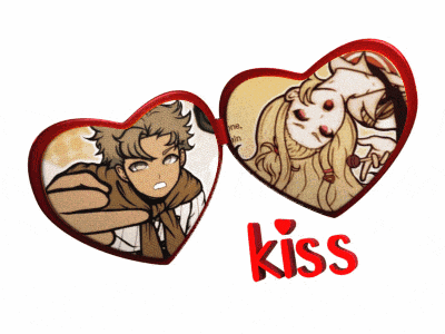a couple of heart shaped mirrors with the word kiss on the bottom