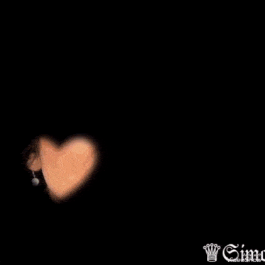 a woman 's face is surrounded by hearts and the words made with videoshow are below her