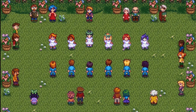 a group of people are standing in a field with flowers in the background