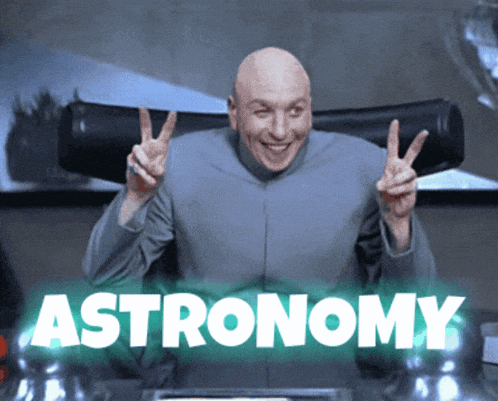 a bald man giving a peace sign with the word astronomy behind him