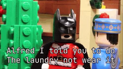 a lego batman says " alfred i told you to do the laundry not wear it " next to a lego man