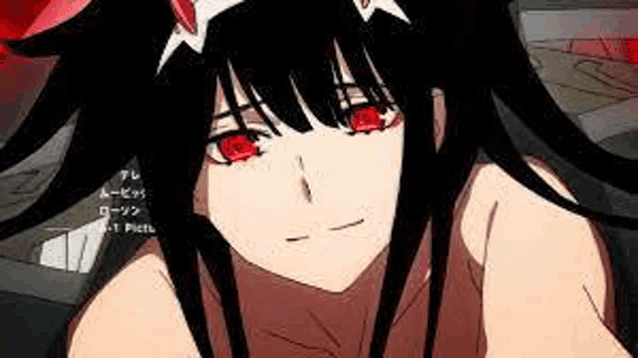 a girl with long black hair and red eyes is laying on the floor .