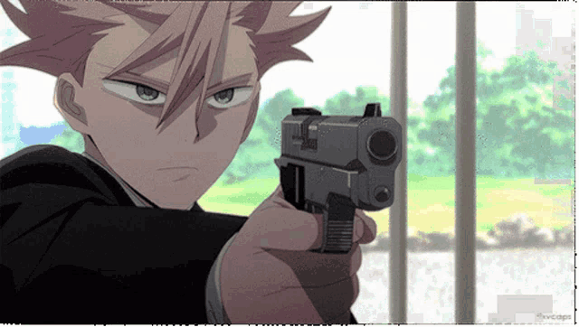 a man in a suit is pointing a gun