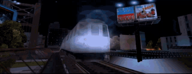 a train is going through a city with a billboard that says travel