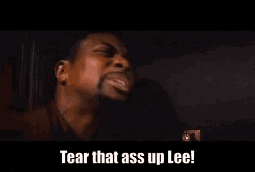 a man is laying on the floor with the words tear that ass up lee written on the bottom
