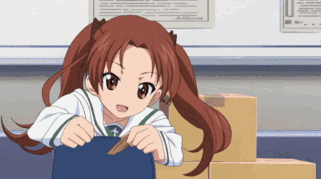 a girl with red hair is holding a blue bag