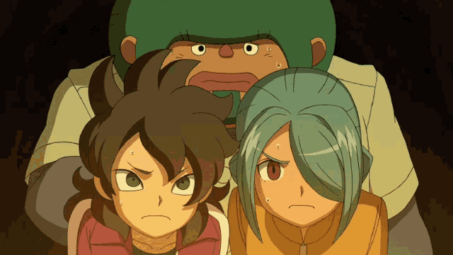 a group of three cartoon characters are looking at the camera
