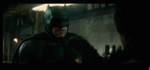 Batman Throat GIF - Batman Throat Punch GIFs